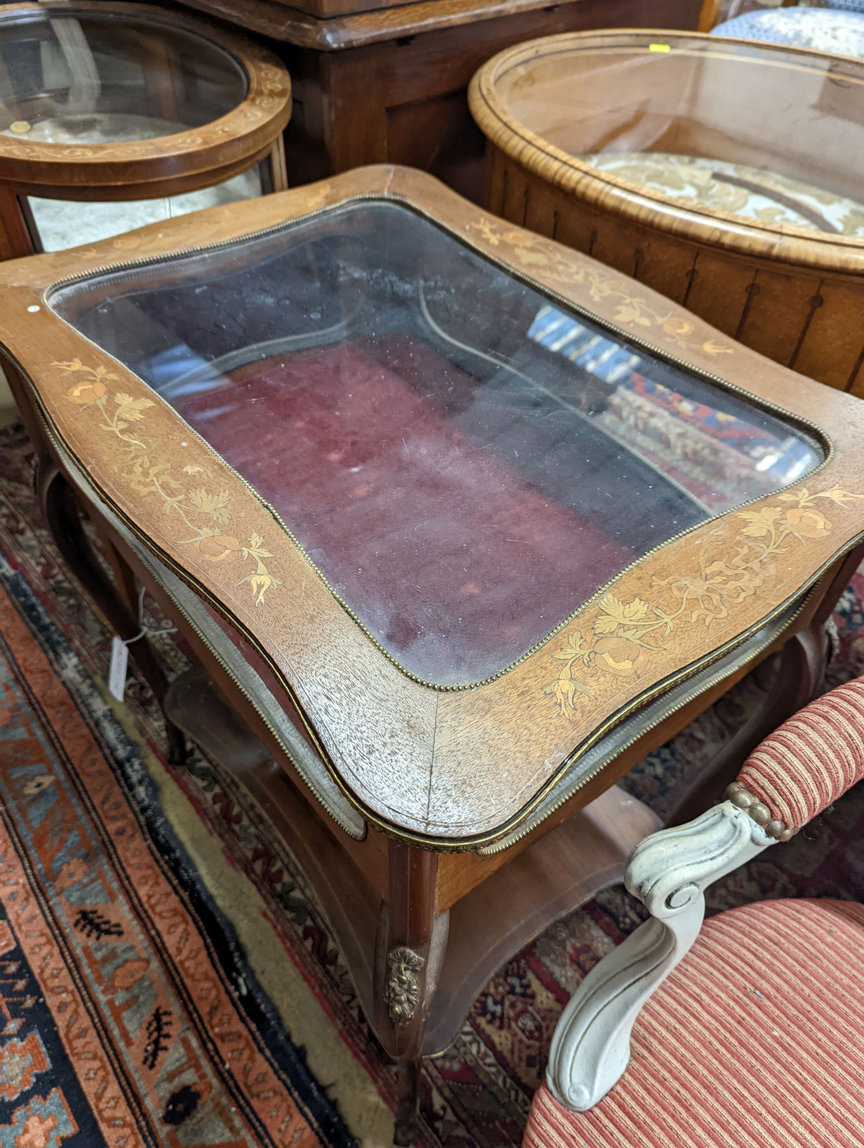 An oval marquetry inlaid mahogany bijouterie table, together with a larger rectangular bijouterie table, larger width 64cm, depth 46cm, height 72cm